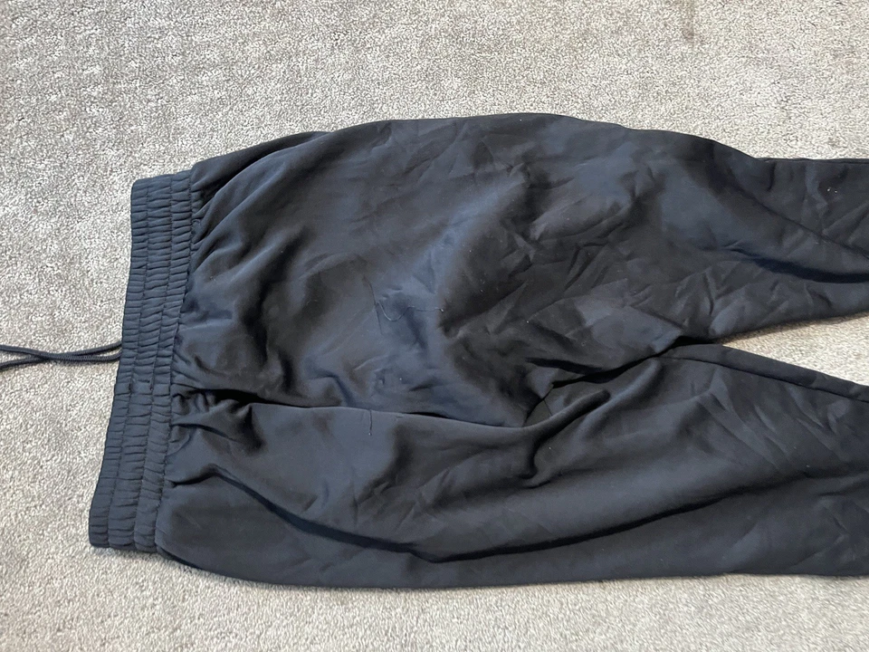 PANTALONES DEPORTIVOS UNDER ARMOUR PARA HOMBRE Sólidos Sueltos Negros Talla Pequeña Poliéster Sólido Hombres Foto 4 de 4