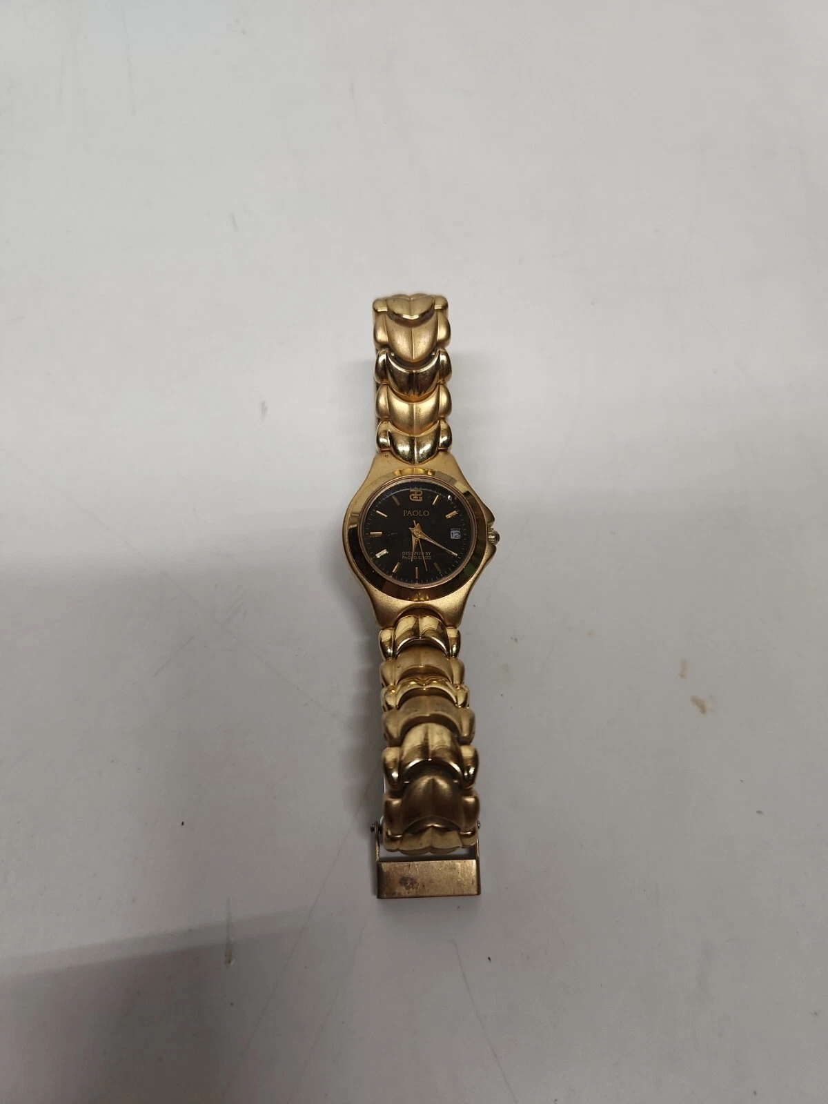 montre paolo gucci A BESOIN D'UNE BATTERIE NEUVE 