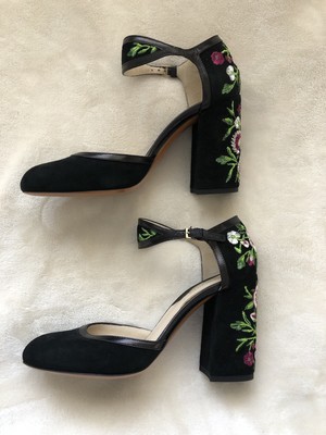 black embroidered heels