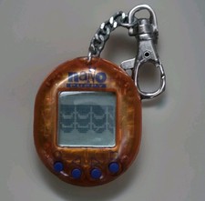 Vtg 1997 Nano Puppy Virtual Pet Playmates Tamagotchi Orange TESTED WORKS