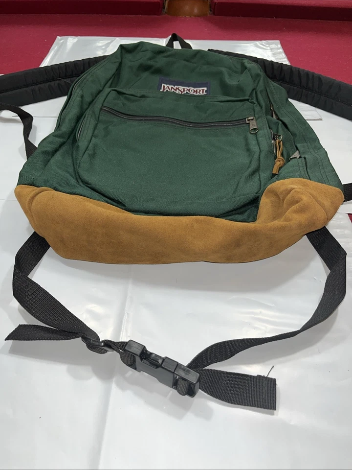 Mochila de viaje vintage años 90 Jansport de lona verde marrón gamuza cuero parte inferior Foto 4 de 4