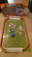 HEXBUG Robotic Soccer Arena Ages 8+ Sports Strategy Kit with robots and remotes.