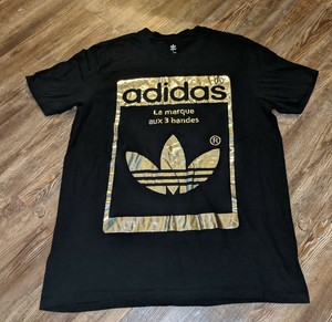 silver adidas shirt