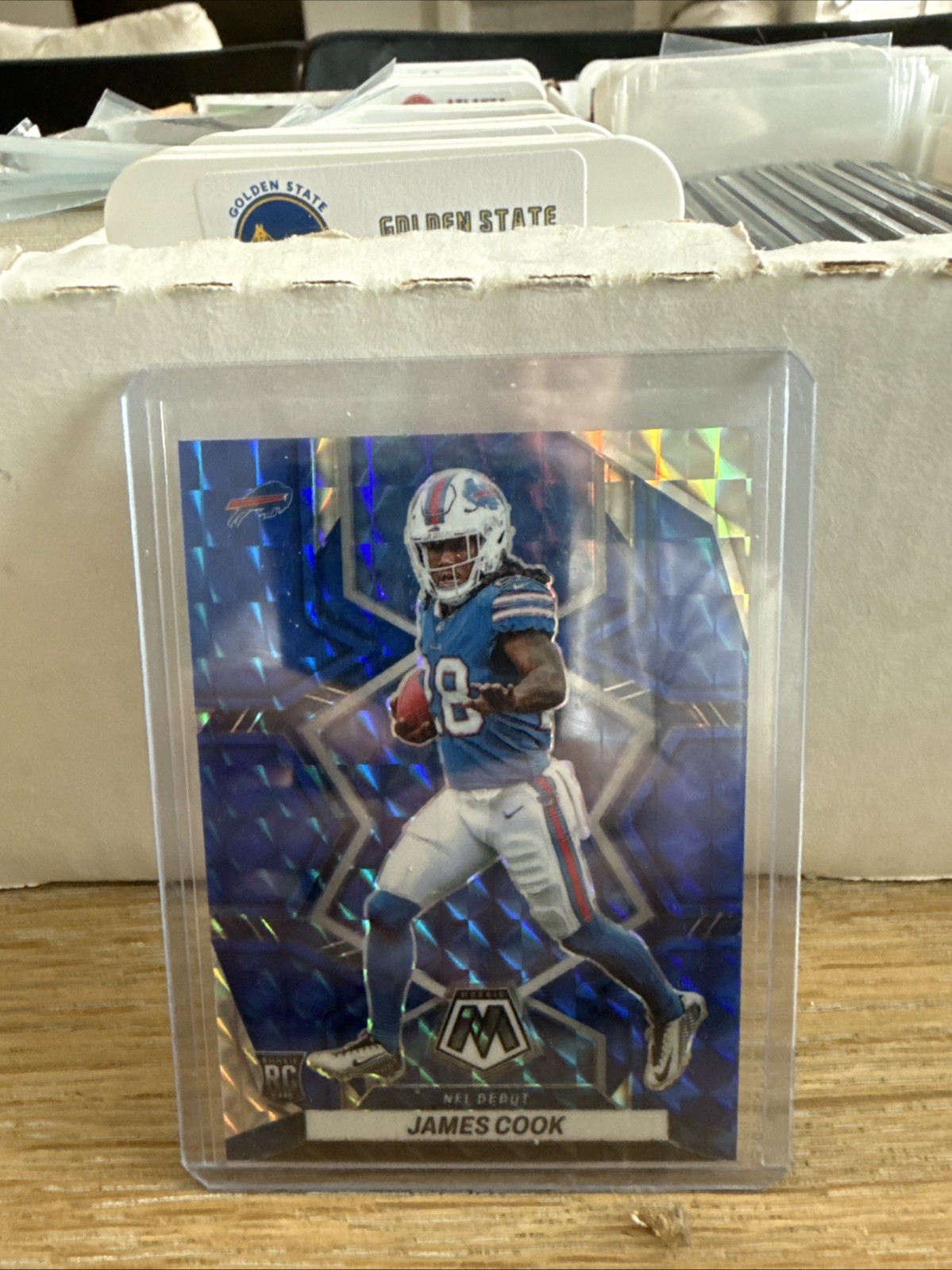2022 Panini Mosaic - NFL Debut James Cook #285 Blue Mosaic Prizm /99 (RC)