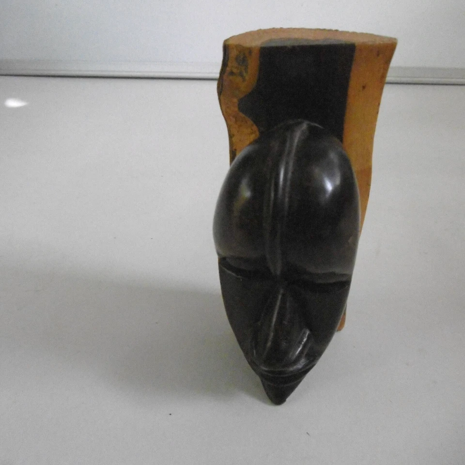 tete sculptée en bois d'ebene kenya ? - Photo 3/4