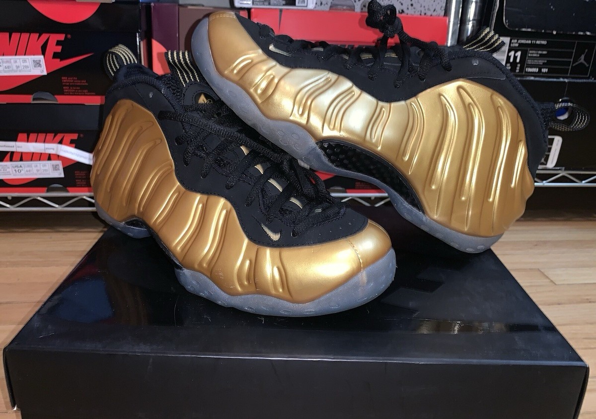 black and gold foamposites