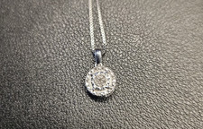 1/10 CT. T.W. Halo Diamond Pendant Necklace in Sterling Silver w/18" chain