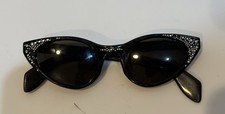 Vintage 1950s women s black cat eye sunglasses with rhinestones.
