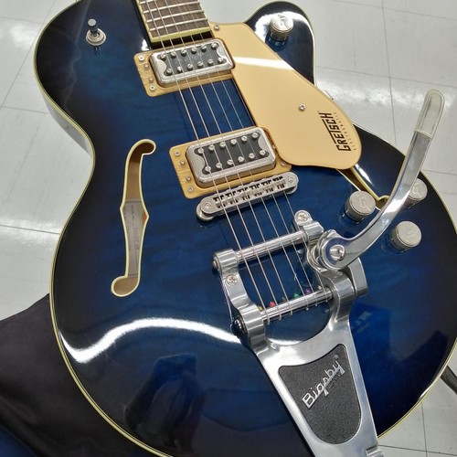 Teal GRETSCH G5655T-QM hollow body electric guitar with gold hardware, silver pickups, and adjustable Bigsby bridge.