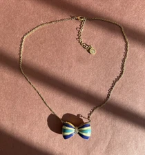 LMTS Gold Tone Necklace With Crème And Green Striped Enamel Bow Pendant