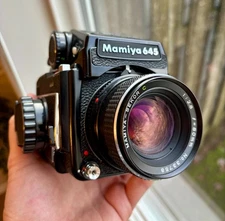 Mamiya 645 Medium Format Camera Bundle (2 lenses; case and L-grip.)