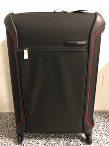 black tumi suitcase