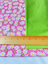 2 cotton remnants daisy print on pink dot 25" x 44" and solid green 15" x 42"