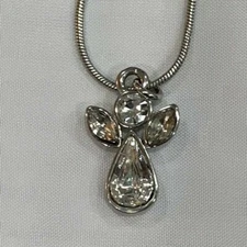 Rhinestone Angel pendant set in silver tone.  Pendant on a 18" snake chain.