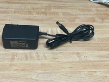 NETGEAR SWITCHING ADAPTER MODEL DSA -12R-12AUS 120120 OUTPUT: 12V 1A  55