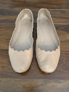 nude scalloped flats