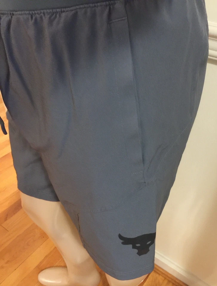 Hombres Under Armour UA Corto Pequeño 3 Bolsillos 1359119 Gris Imparable Project Rock Foto 2 de 4