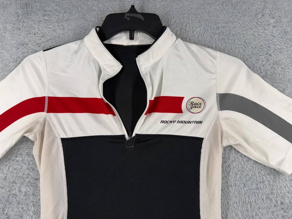 Camiseta deportiva de ciclismo Race Face para mujer pequeña roja blanca negra Rocky Mountain 1/4 cremallera Foto 4 de 4
