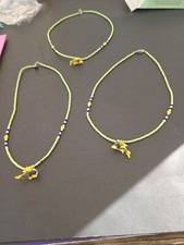  1 BEADED GIRLS NECKLACE WITH GLASS DOLPHIN 3 available