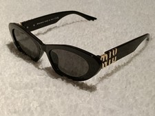 Miu Miu Sunglasses MU06ZS 1AB5S0 Black Dark Grey