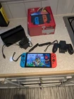 Nintendo Switch OLED Model – Neon Red/Blue – Very Good Condition – Boxed
