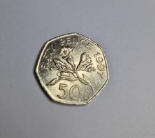1997 Bailiwick Of Guernsey Freesia Flower 50p Coin - GOOD CIRCULATED CONDITION.
