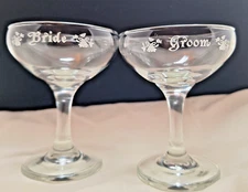 Wedding stem glasses bride and groom label wine and champagne toasting excellent