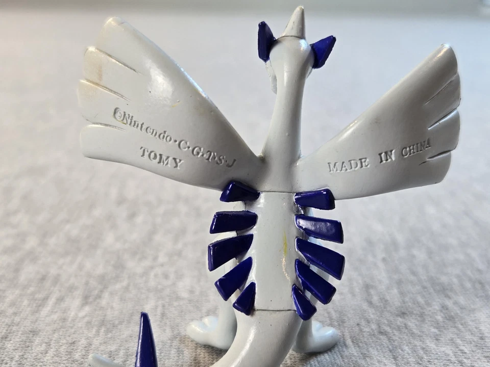 Figura de acción Pokemon Lugia 2000 vintage TOMY Nintendo juguete con moneda Pog coleccionar Foto 3 de 4