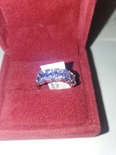 Tanzanite 5 Oval Cut In Four Claws Setting 10k White Gold Size 6. Appraised 1800