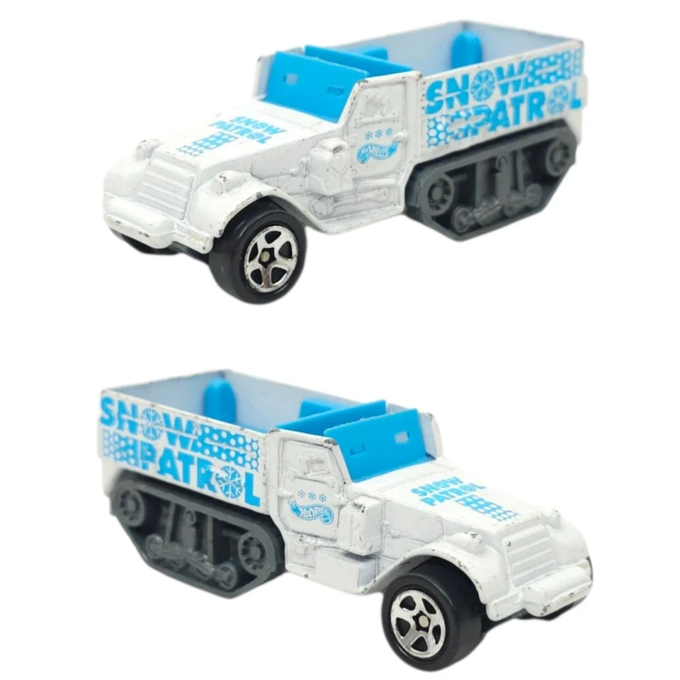 Lote de camiones de servicio eléctricos Hot Wheels Moto Crossed Land Rover Serie 3 SwingFire Foto 4 de 4