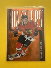 connor bedard. 2025/26 UD Orange Dazzlers Card