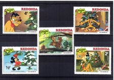 140+  TIMBRES  WALT DISNEY   SERIE   REDONDA