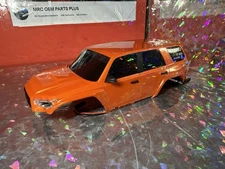 Pro-Line Axial SCX24 2024 Toyota 4Runner TRD Pro Hard Body Orange Complete W/led