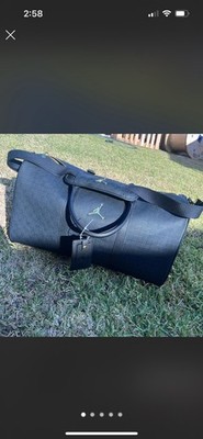 Nike Air Jordan Monogram Duffle Bag Black/Gold Pre Owned No Visible Flaws
