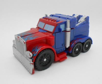 Hasbro Transformers Quick Change Optimus Prime Michael Bay Flames 2008