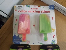 NEW 2 pack green and pink Color mixing slime with reusable Popsicle cases 