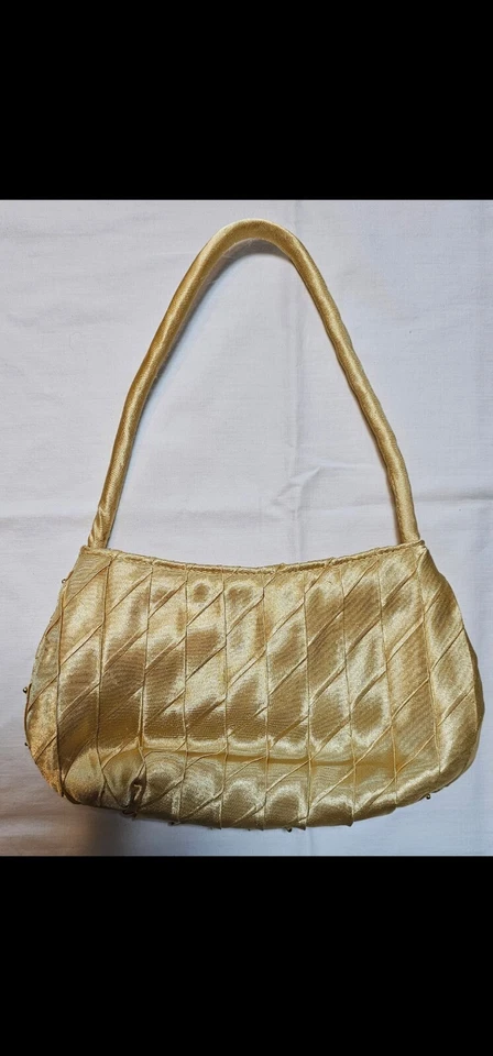 Cartera vintage SASHA hecha a mano en China dorada satinada para niños Foto 2 de 4