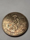 The American Prospector 1985 One Ounce Silver Coin Toned