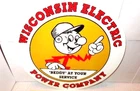 VINTAGE WISCONSIN ELECTRIC POWER COMPANY "REDDY KILOWATT" 11 3/4" METAL GAS SIGN