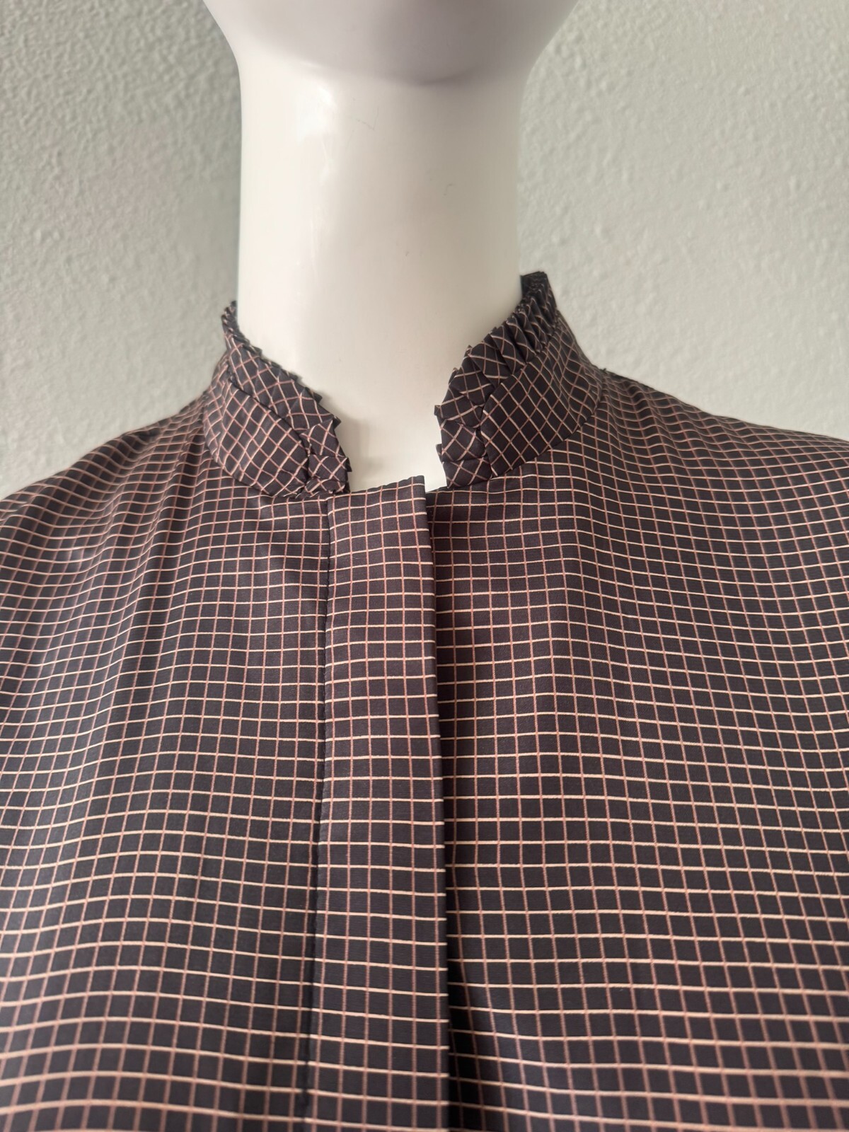 Long sleeve v neck ruffle button top