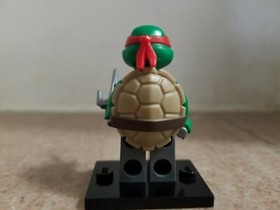 LEGO Teenage Mutant Ninja Turtles Armored Raphael Minifigure from Set 79119 EUC 