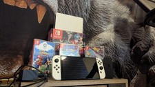 Nintendo Switch OLED Weiß 64GB + 3 Super Mario Spielepaket
