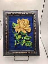 Picture yellow rose blue background in cross-stitch with vintage wood frame.