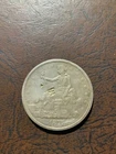 1877 trade dollar with chop marks