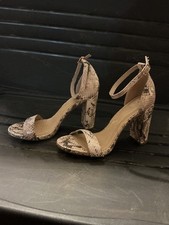 Faux Snake Skin heels. Size 7