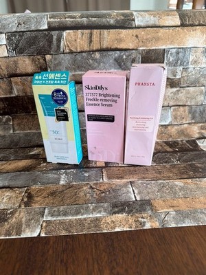 Skincare Bundle: SCINIC Sun Essence SPF 50+, SkinDilys Brightening Serum, and PH