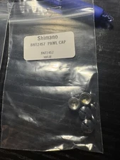 1 Shimano Part# BNT 2457 Pawl Cap Fits Calcutta TE, DC 700 200 401 400 ...