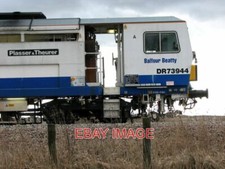 FOTO DR 73944 - PLASSER & THEURER TAMPER/LINER (DETALLE) PARA UNA VISTA COMPLETA DE THI