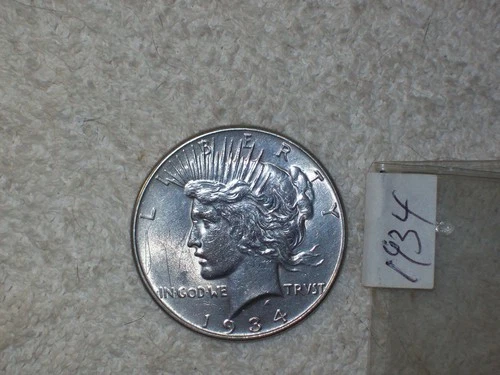 1934 PEACE DOLLAR UNCIRCULATED DETAILS SCRATCHES ON OBVERSE