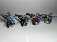 Vintage Japan Lot Of 4. 2-Police, 1-fire And 1- Army Tin Helicopter Push Toy